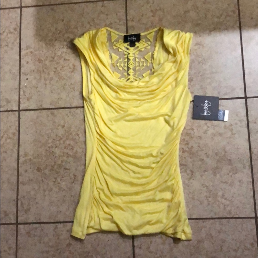 Yellow form fitting cowl neck tank!